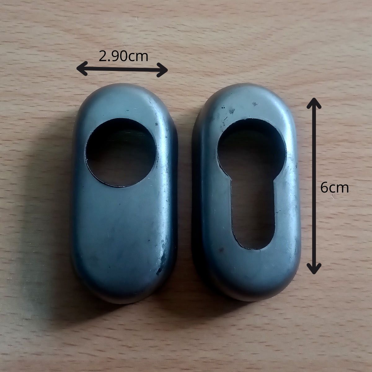 Par de protectores de cilindro ovalados interno y externo donde se muestra su ancho (2.90 cm) y altura (6 cm).